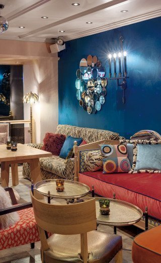 Colorful interior of the "Pöstli Lounge" in Davos