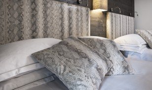 Pillow on the double bed at the Morosani "Fiftyone" in Davos