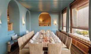 Long prepared table at the Veranda in the Morosani "Schweizerhof"