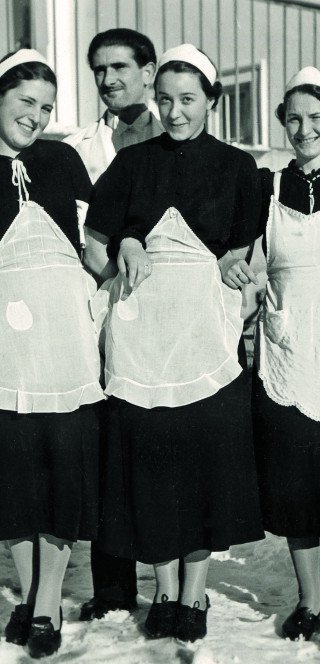 Three maids in the history of 110 Years Posthotel in Davos