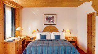 Double bed at the Morosani "Posthotel" Junior Suite