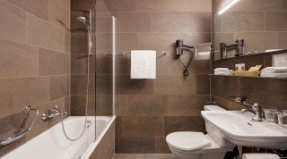 Bathroom of the Single Standard Room at the Morosani "Haus Poschiavo"