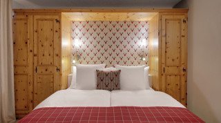 Doppelzimmer Sport Bett im Haus Poschavio