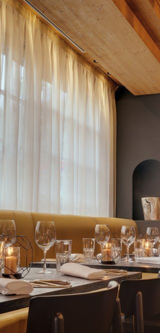 Tische im Pöstli Grill Restaurant in Davos