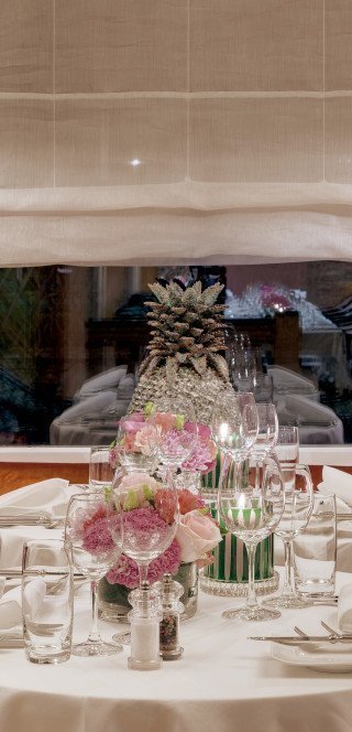 Prepared tables in the "Pöstli" restaurant of the Morosani Hotel in Davos