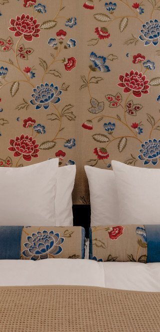 Large bed in the superior room of the Morosani Hotel in Davos